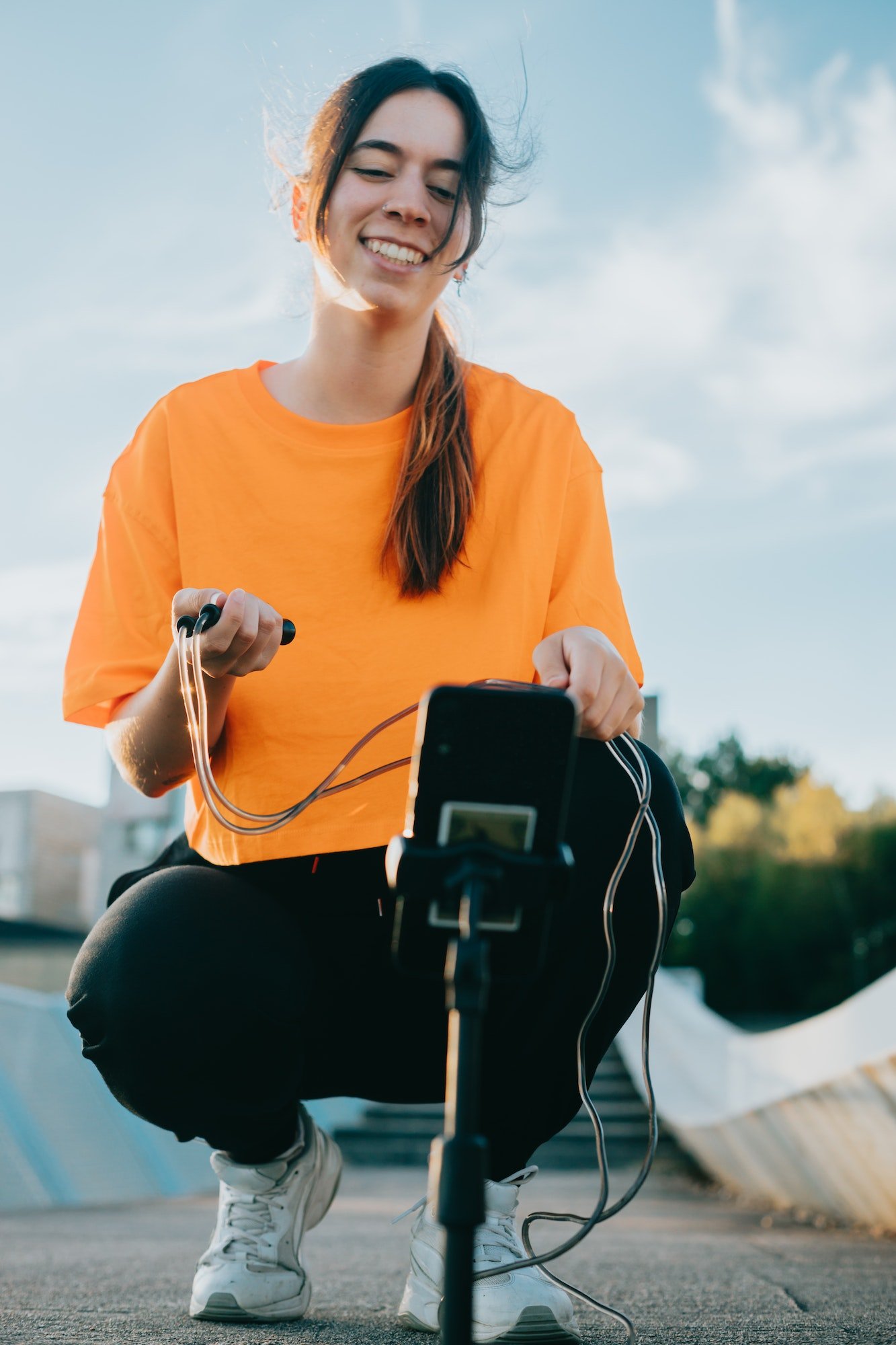 young-woman-holding-a-jumping-comb-and-showing-it-to-followers-on-stream-live-healthy-influencer-s.jpg